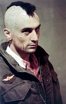 Travis Bickle with a mohawk, field jacket, and bloodied shirt, looking sinister.